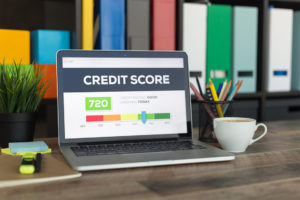 Laptop showing a good credit score